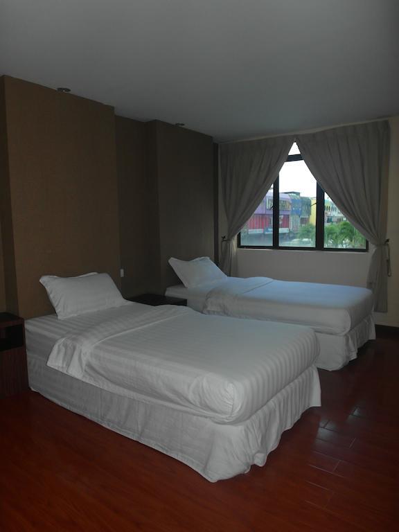 Mcity Inn Miri Rom bilde