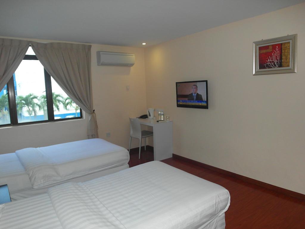 Mcity Inn Miri Rom bilde